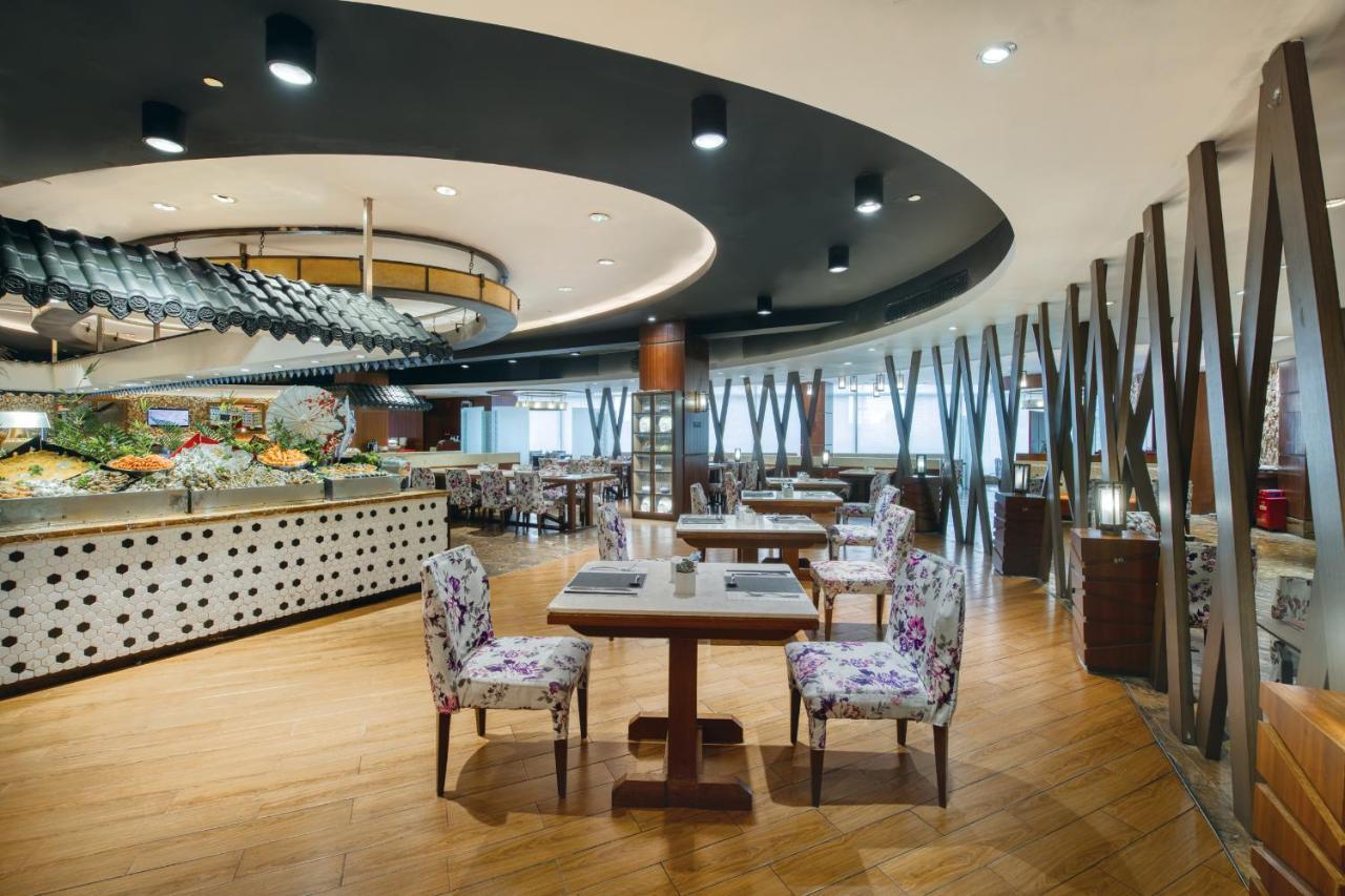 Crowne Plaza Guangzhou City Centre By Ihg - Free Shuttle Between Hotel And Exhibition Center During Canton Fair & Exhibitor Registration Counter Exterior foto The interior of the restaurant